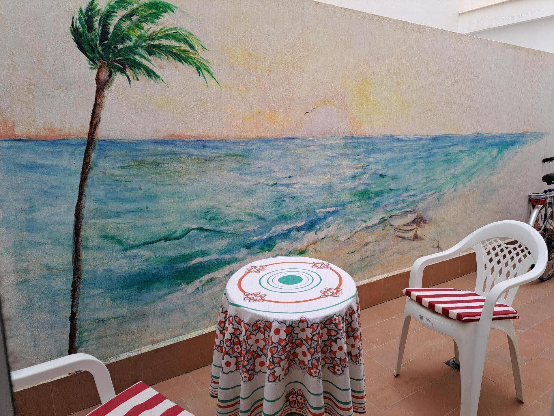 Moderne Ferienwohnung mit kleinem Patio am Playa d Ferienwohnung in Spanien