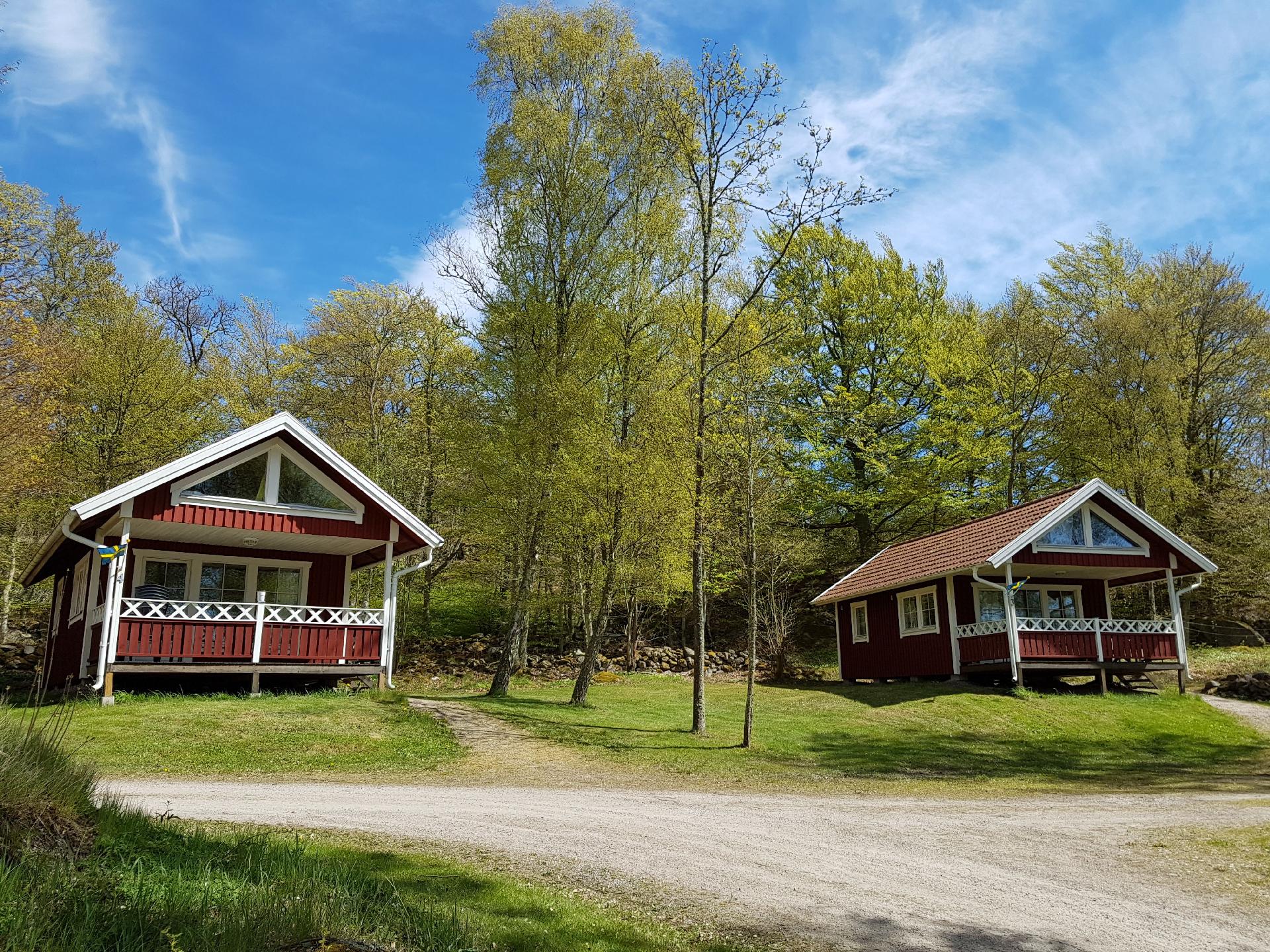 Holzhaus mit überdachter Terrasse Ferienhaus in Schweden