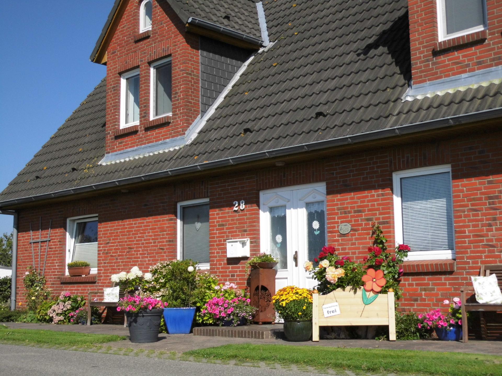 Wohnung in Osterdeich mit Terrasse und Garten Ferienhaus  Nordstrand
