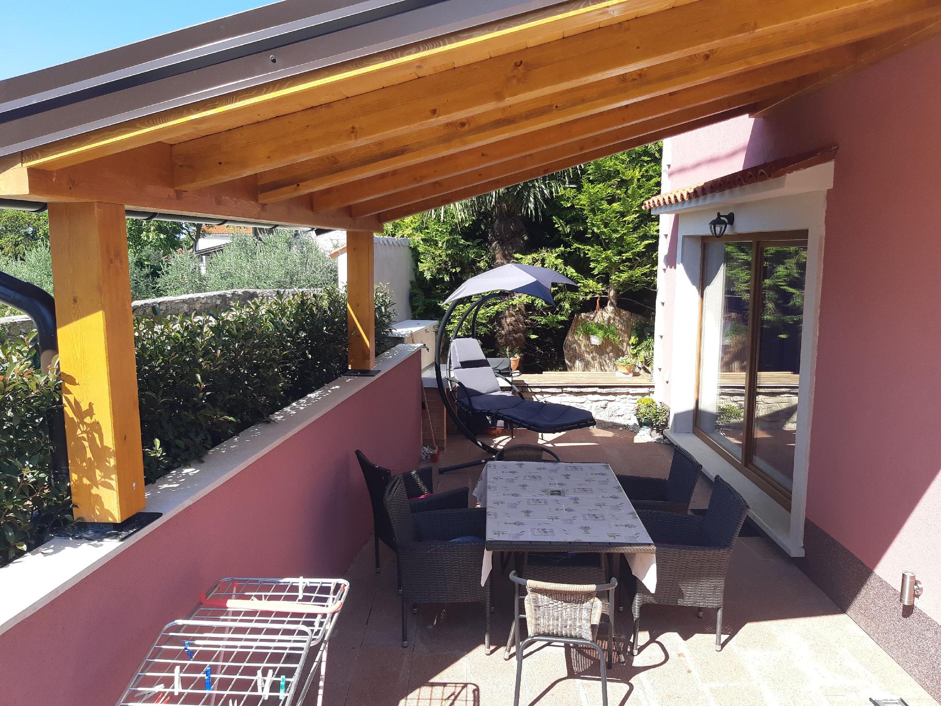 Ferienwohnung mit Terrasse für sechs Personen Ferienhaus 