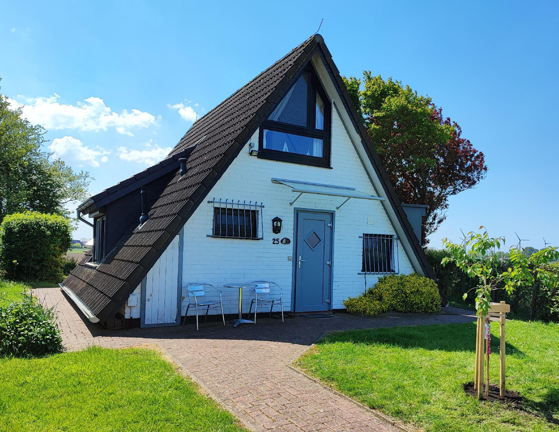 Ferienhaus mit Terrasse und Garten in einer Anlage Ferienhaus in Niedersachsen