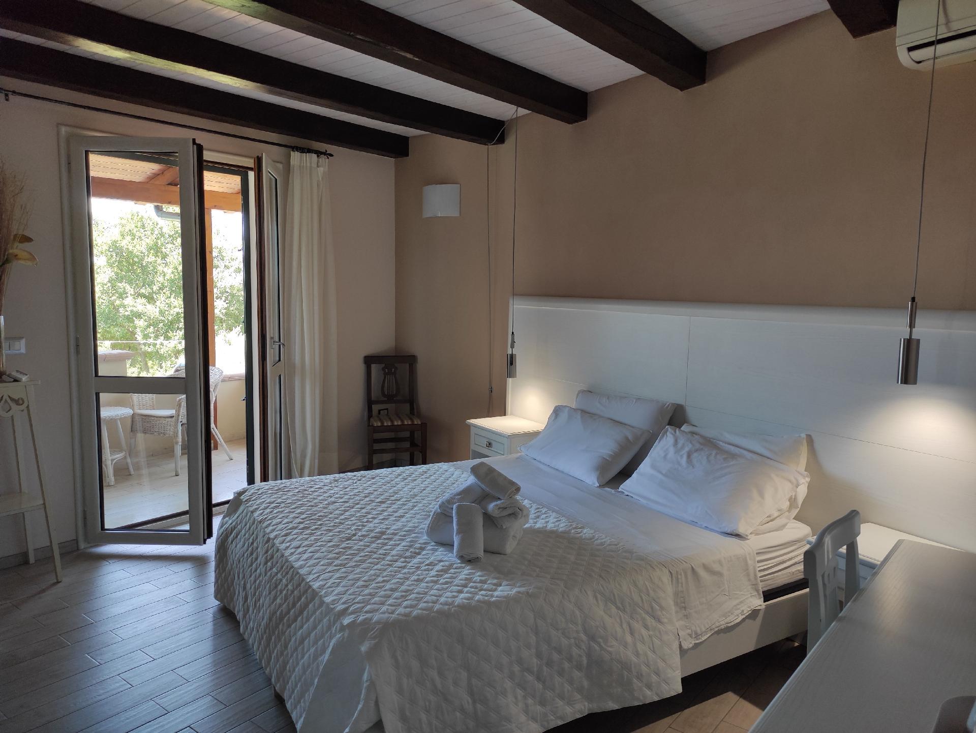 Gästezimmer mit Terrasse Ferienhaus in Italien